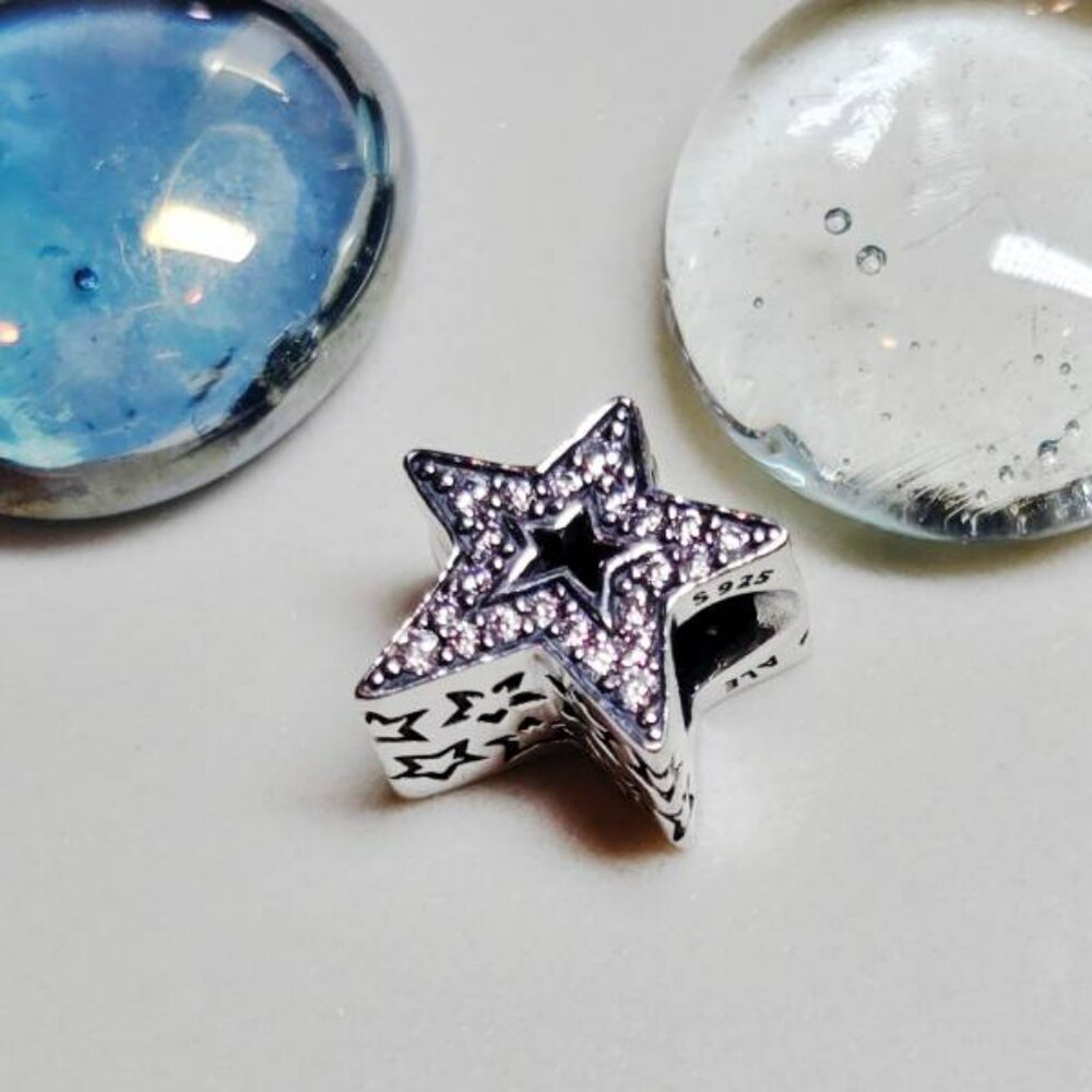New Authentic Pandora Sparkling Asymmetrical Star Charm S925